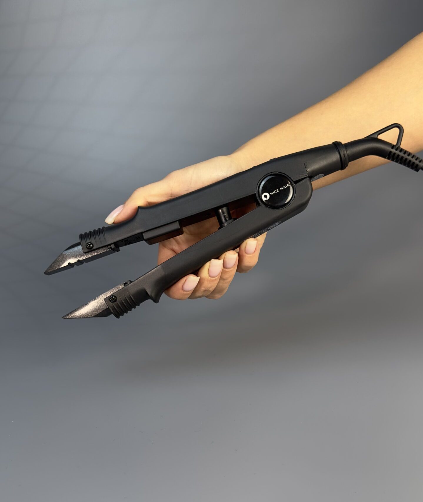 Hair extensions tongs with temperature control - Image 1